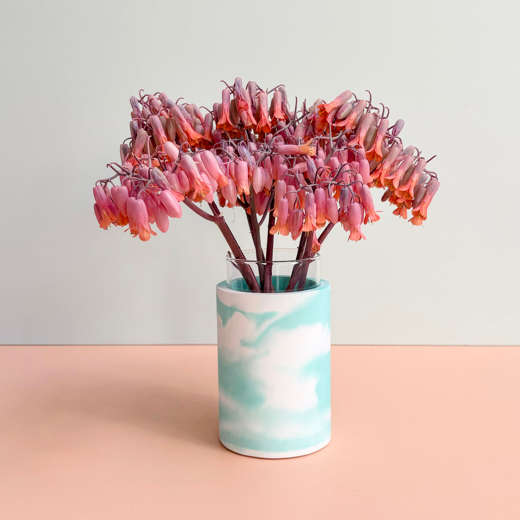 Swirling teal and white vase