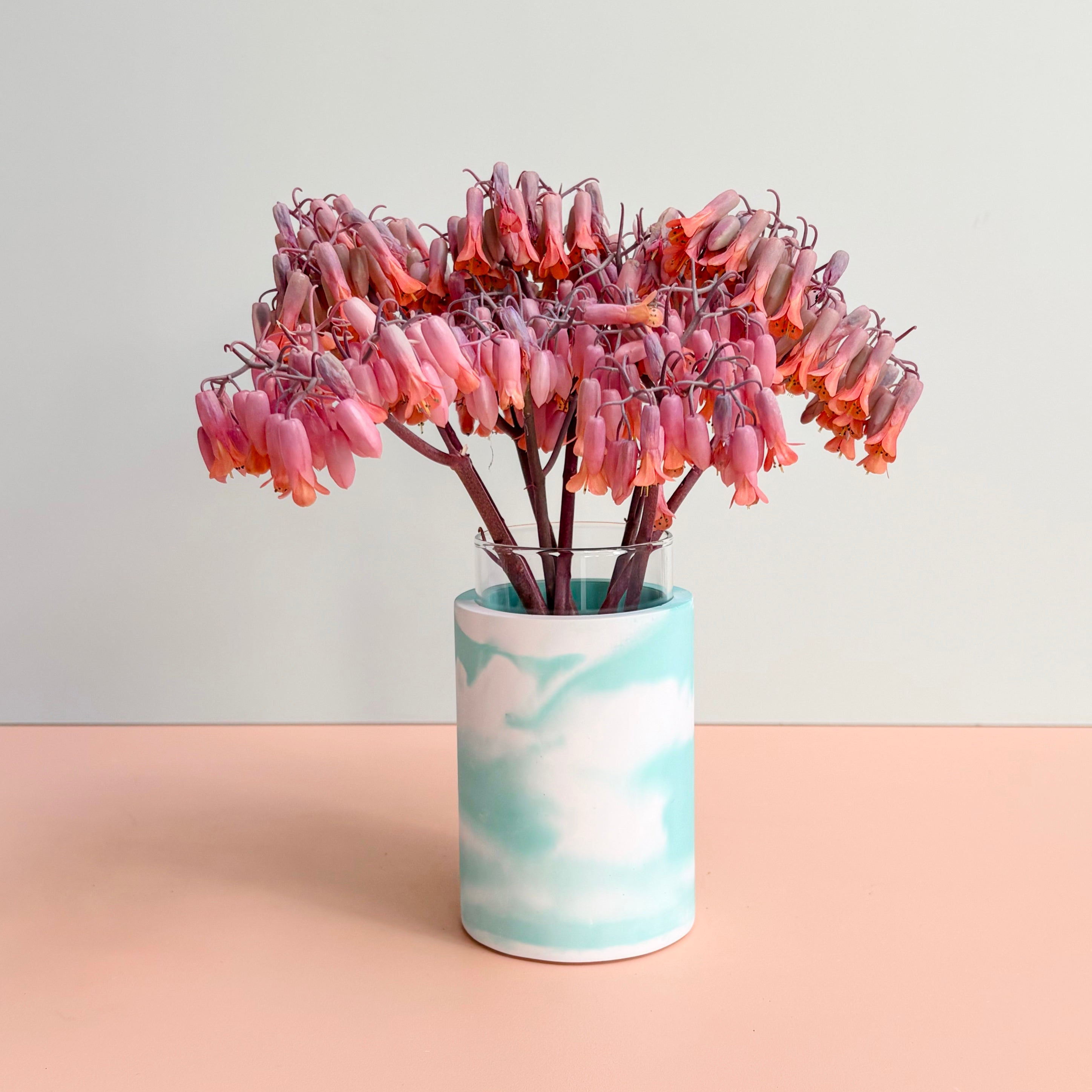 Swirling teal and white vase
