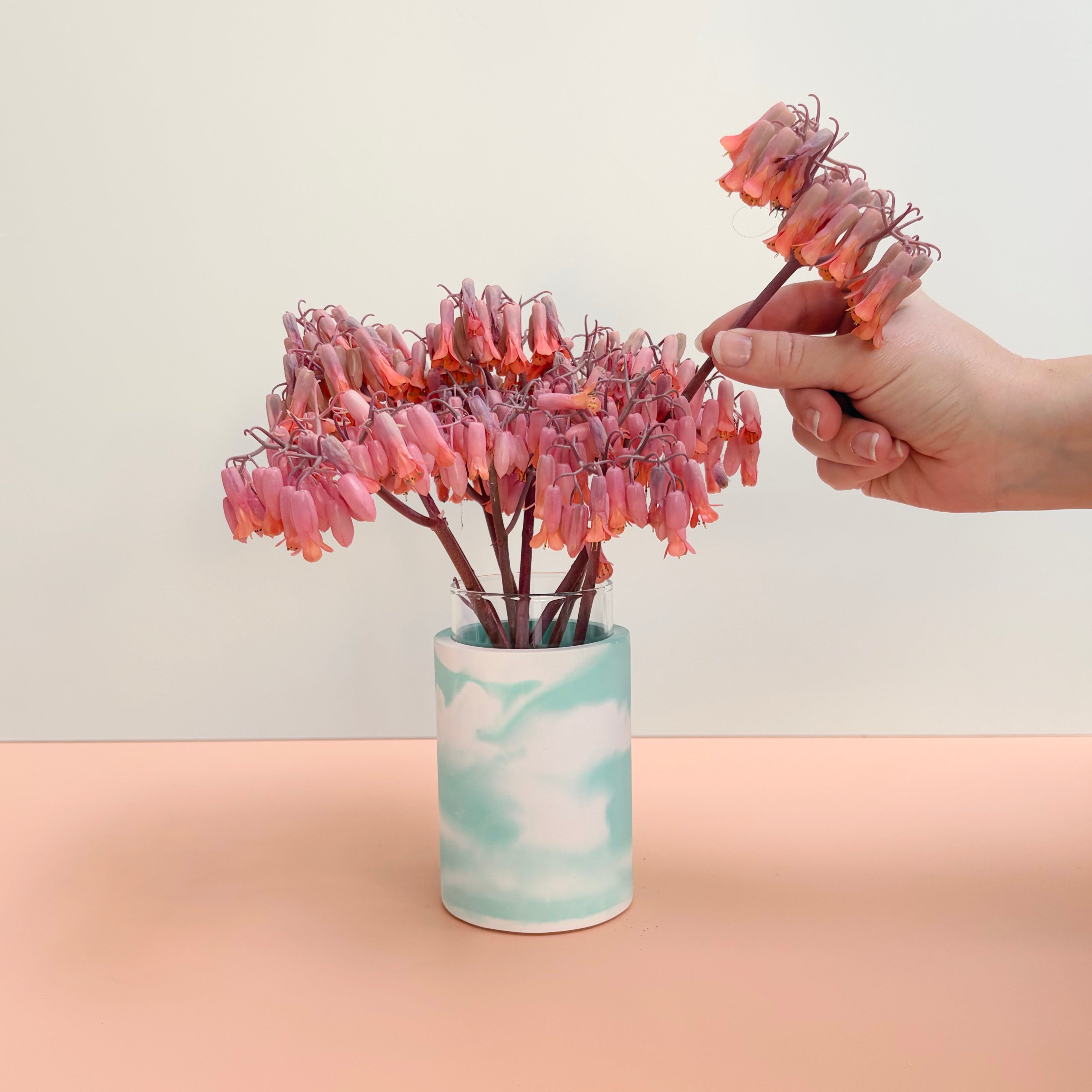 Swirling teal and white vase