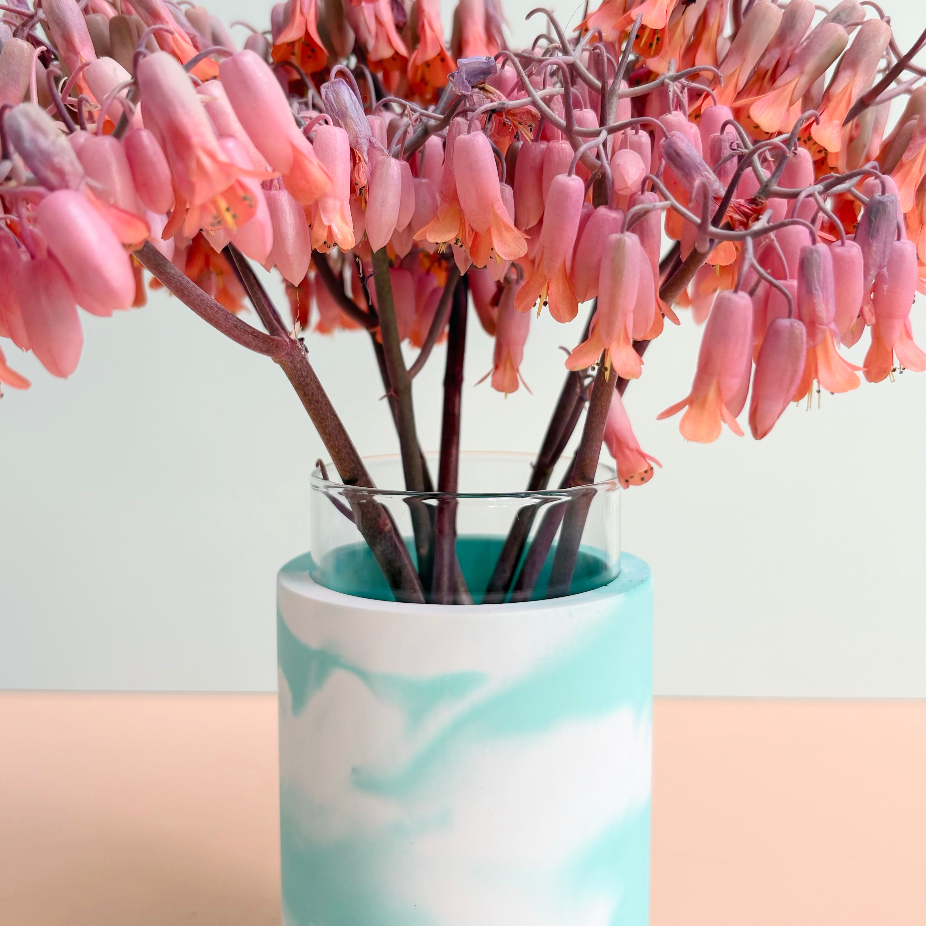 Swirling teal and white vase