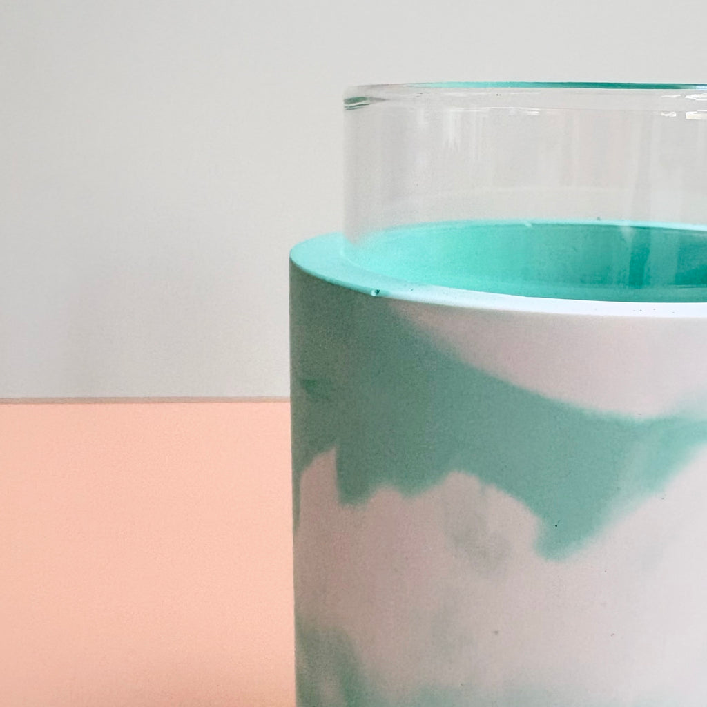 Swirling teal and white vase
