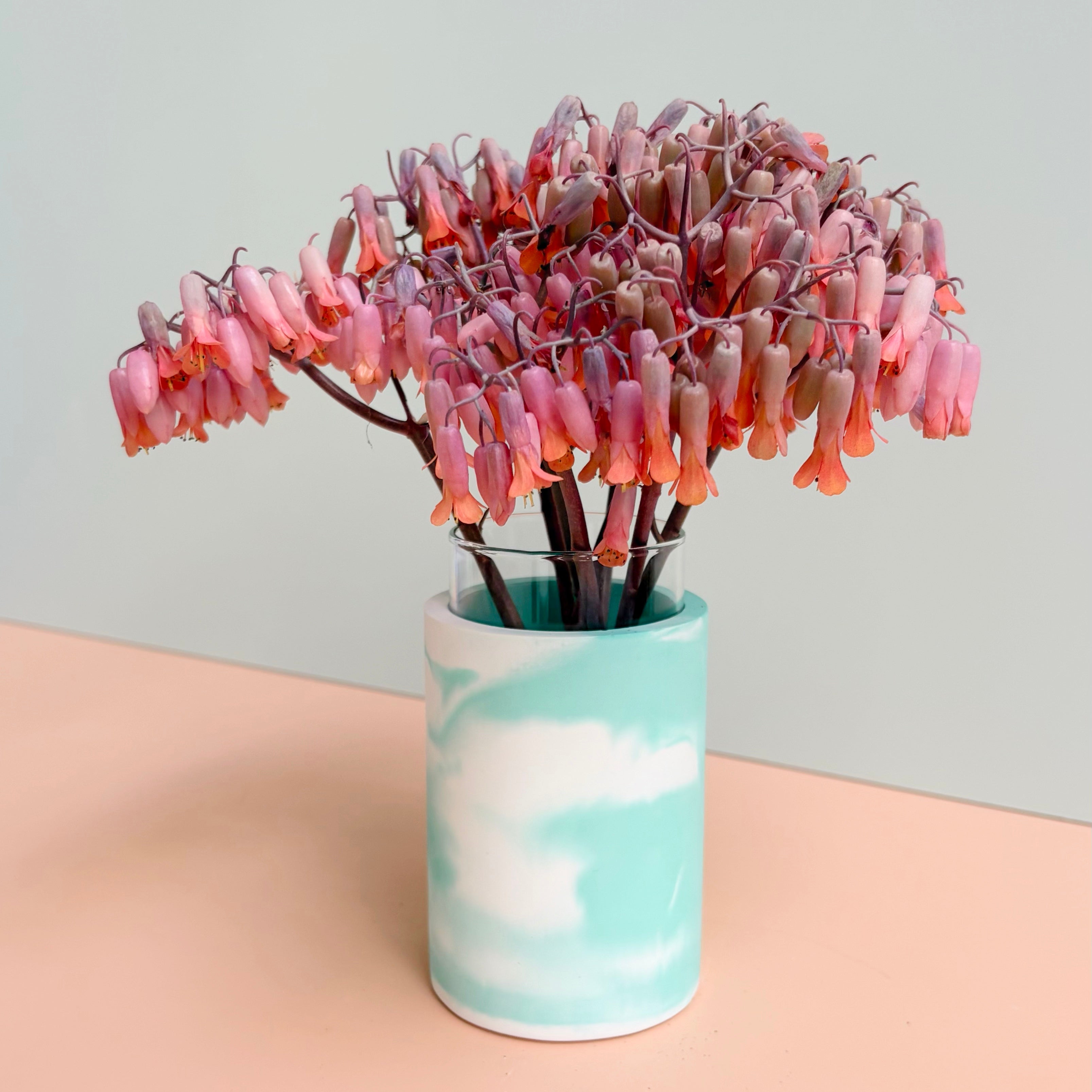 Swirling teal and white vase