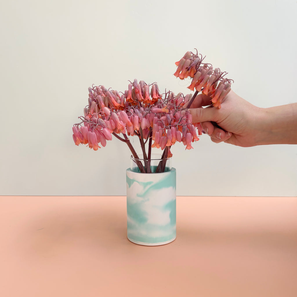Swirling teal and white vase